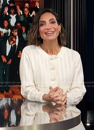 Courtney’s white cable knit cardigan on E! News
