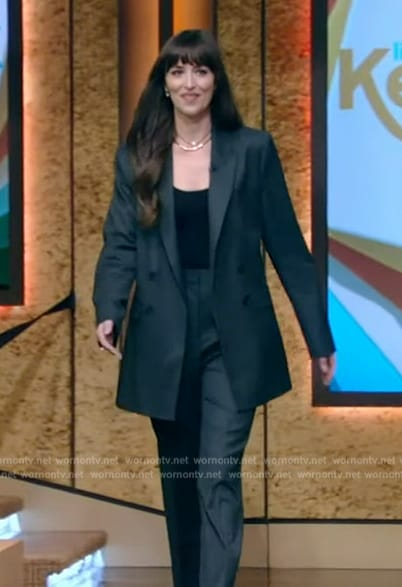Dakota Johnson’s pinstripe blazer and necklace on Live with Kelly and Mark