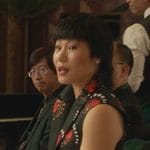 Eleanor’s black printed sleeveless blazer on Death and Other Details
