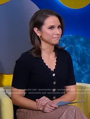 Elizabeth’s black scalloped cardigan on Good Morning America