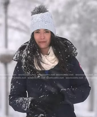 Emilie’s navy down coat and blue pom pom beanie on Today