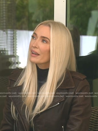 Erika’s navy top and brown leather moto jacket on The Real Housewives of Beverly Hills