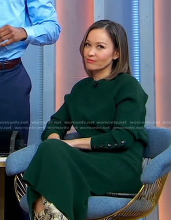 Eva’s green button sleeve sweater and skirt on Good Morning America