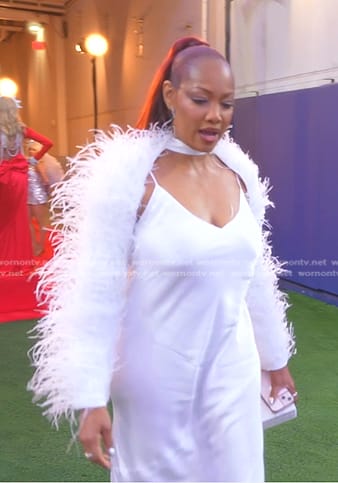Garcelle’s white feather sleeve top on The Real Housewives of Beverly Hills
