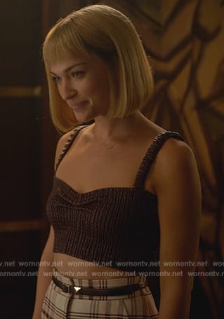 Imogene’s burgundy leather smocked top on Death and Other Details