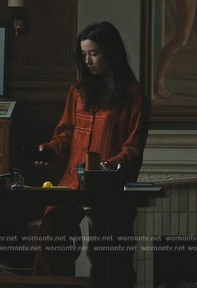 Janes’ orange printed pajamas on Mr. & Mrs. Smith