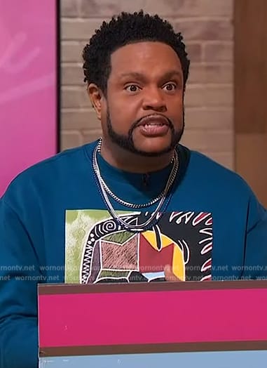 Jawn’s blue face graphic sweatshirt on Sherri