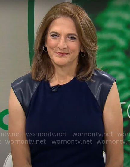 Jill Schlesinger’s navy dress with leather shoulders on CBS Mornings