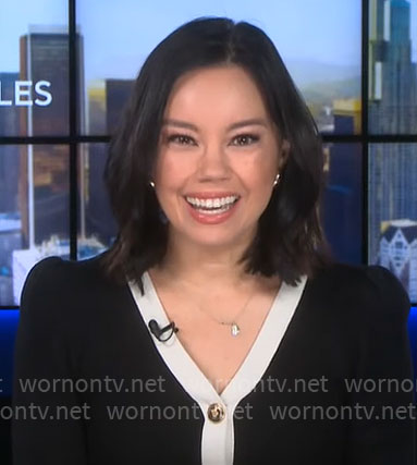 Jo Ling Kent’s black cardigan with white trim on CBS Mornings