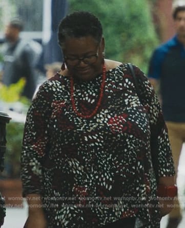 John’s Mom’s black printed top on Mr. & Mrs. Smith