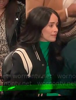 Julia’s black and white bomber jacket on Extended Family