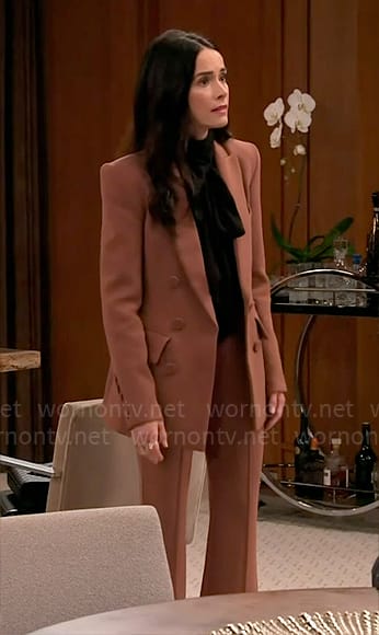 Julia’s brown suit on Extended Family
