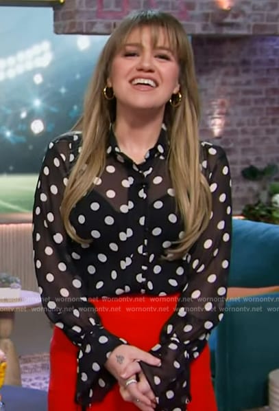 Kelly’s black polka dot print tie cuff blouse on The Kelly Clarkson Show