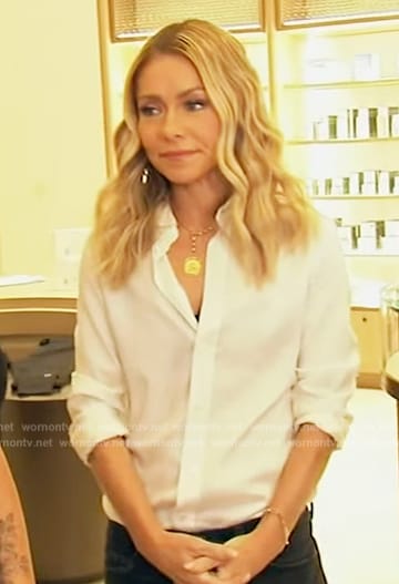 Kelly’s white striped blouse on Live with Kelly and Mark