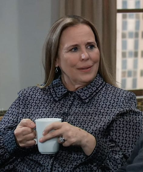 Laura’s black geometric print button down blouse on General Hospital