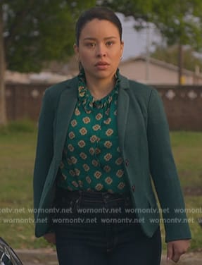 Mariana’s green printed ruffle neck top on Good Trouble