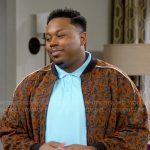 Marty’s orange printed bomber jacket on The Neighborhood