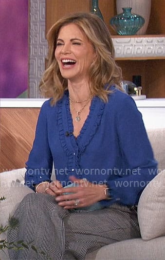 Natalie’s blue v-neck ruffle trim top on The Talk