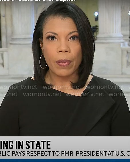 Nikole Killion’s black asymmetric neckline dress on CBS Mornings