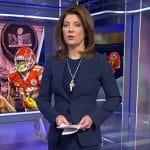 Norah’s navy blazer and skirt on CBS Evening News