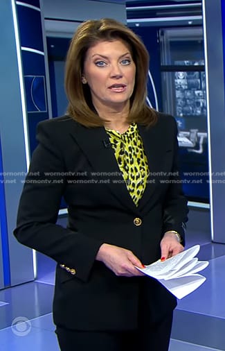 Norah’s yellow leopard blouse and black blazer on CBS Evening News