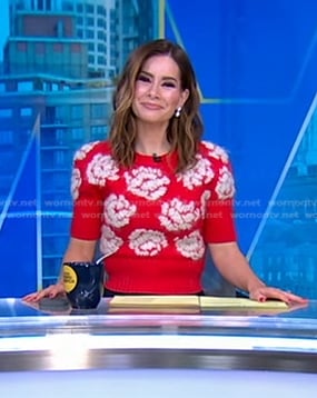Rebecca’s red floral embroidered sweater on Good Morning America