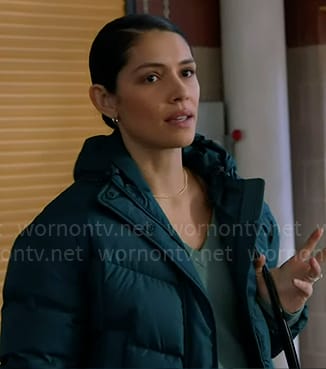 Stella’s teal green puffer jacket on Chicago Fire