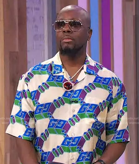 Wyclef’s GG printed shirt on Sherri