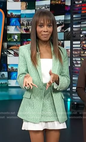 Zuri’s green tweed blazer and skirt on Access Hollywood