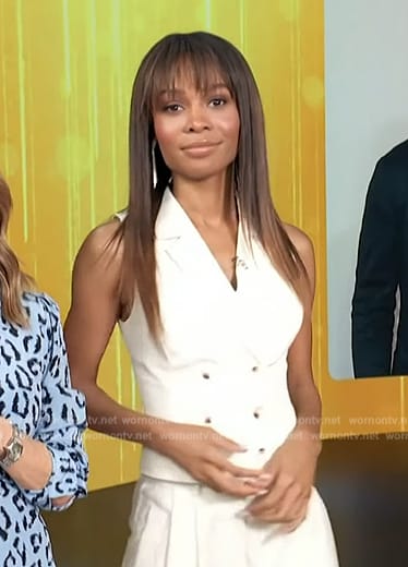Zuri’s white double breasted vest on Access Hollywood