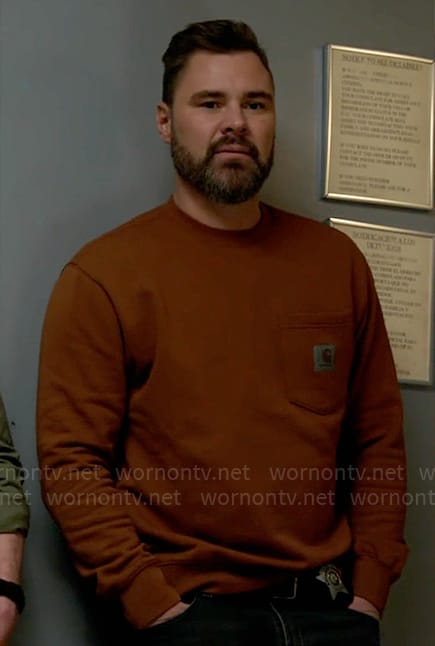 Adam’s rust brown sweatshirt on Chicago PD