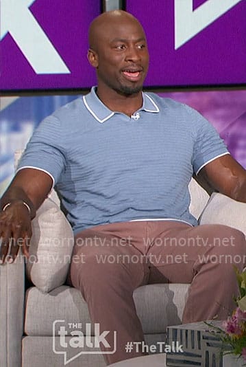 Akbar’s blue knit polo top on The Talk
