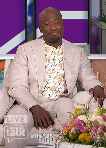 Akbar’s yellow floral print shirt on The Talk