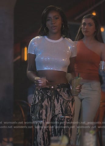 Annita’s white sequin top and camo pants on Grown-ish