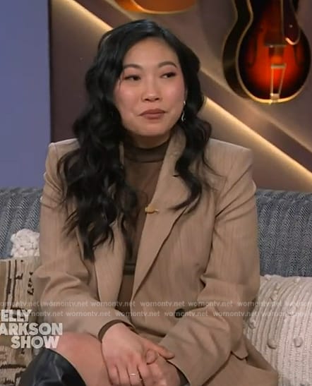 Awkwafina’s beige pinstripe blazer and skort on The Kelly Clarkson Show