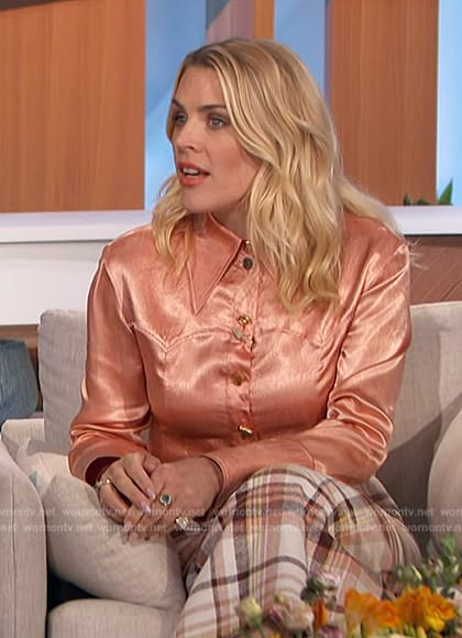 Busy Phillips’ plaid skirt and pink satin blouse on The Talk
