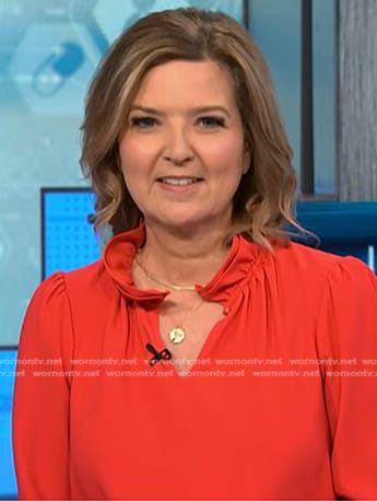 Christine Roman’s red ruffle neck top on NBC News Daily