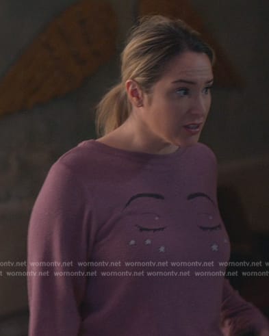Davia’s purple eye print sweater on Good Trouble
