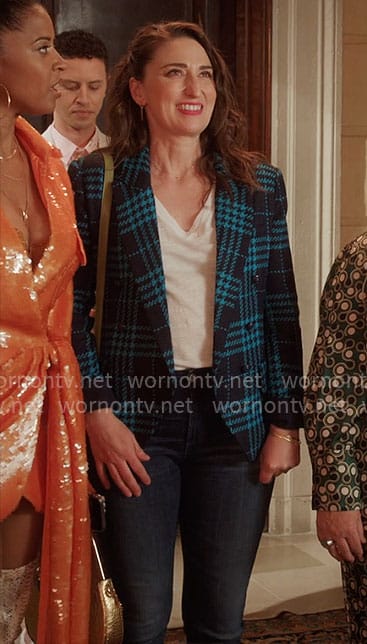 Dawn’s blue plaid blazer and green bag on Girls5eva