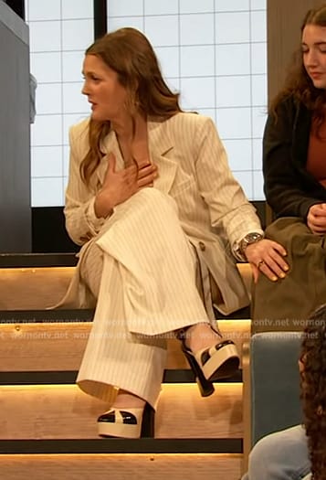 Drew’s white tie neck blouse and pinstripe blazer on The Drew Barrymore Show