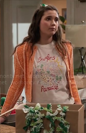 Grace’s Surfers Paradise t-shirt and orange cardigan on Extended Family