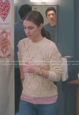 Jules’ white bobble knit sweater on Greys Anatomy