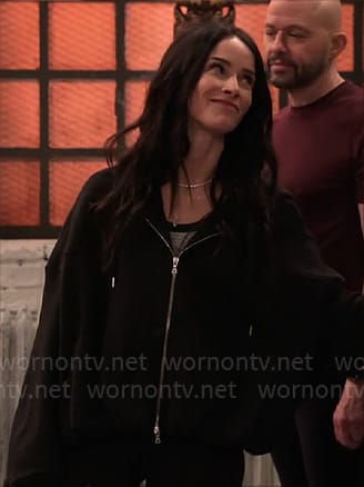 Julia’s black zip hoodie on Extended Family