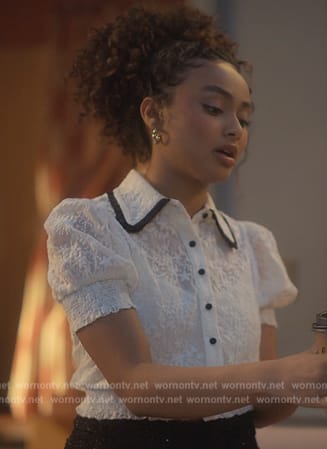 Kiela’s white contrast lace top on Grown-ish