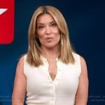 Kit’s white button sleeveless top on Access Hollywood