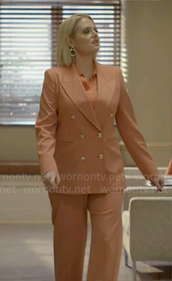 Lexi’s coral suit on Not Dead Yet