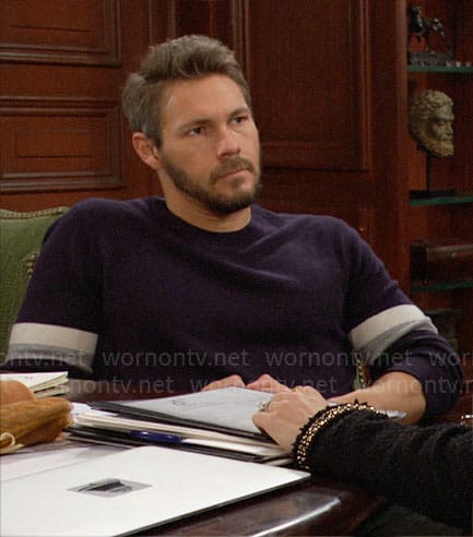 Liam’s navy sweater with striped sleeves on The Bold and the Beautiful