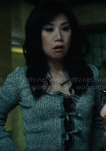 Mel’s metallic top with bows and pearly jeans on The Equalizer