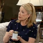 Nikki’s navy grommet studded dress on The Young and the Restless