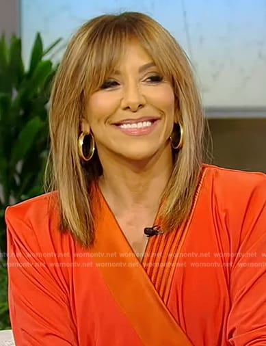 Sara Azari’s orange wrap jumpsuit on Tamron Hall Show